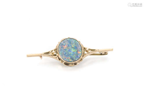 A vintage gold brooch, having oval simulated opal, base metal pin, 5.3cm
