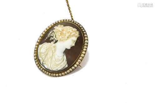 A 19th Century shell cameo on gold mount, with seed pearl frame, the oval cameo carved depicting a