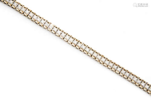 A 9ct gold diamond set bi colour tennis bracelet, 20cm max length, 12g