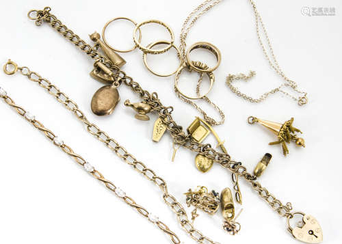 A collection of gold jewellery, including various gem set rings, a gem set bracelet, gold curb