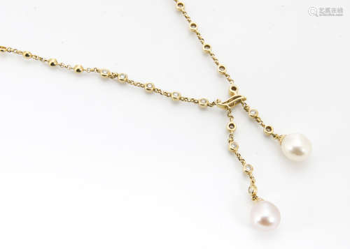 An 18ct gold contemporary diamond and pearl drop necklace, the brilliant cut diamonds set to chain