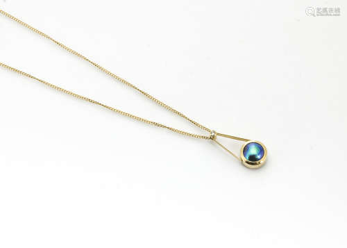 An 18ct gold abalone and diamond set drop pendant, on a fine curb linked 18ct gold chain, 5.3g