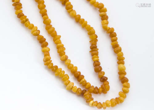 A string of amber pebble beads, in toffee colour, 50cm, 37g