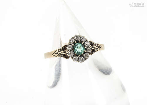 A mid 19th Century 18ct gold emerald and diamond cluster ring, old cuts surrounding a round green