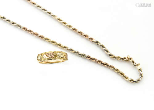 A 10ct bi colour gold necklace and matching ring, with engraved floral design, marked 10k, 26.6g