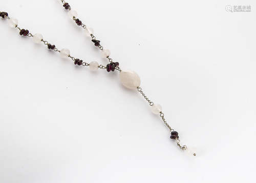 A rose quartz and garnet white metal set necklace, the rose quartz spheres alternately set with