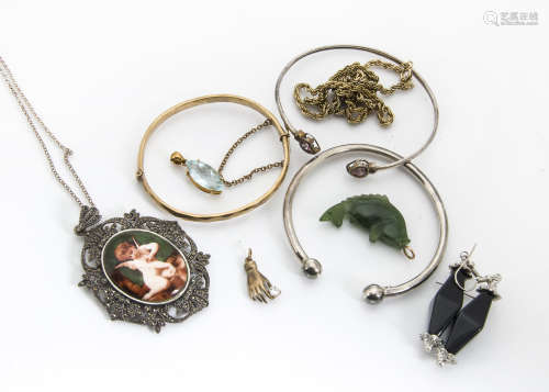 A small collection of costume jewellery, including a silver and enamel drop pendant, a pair of