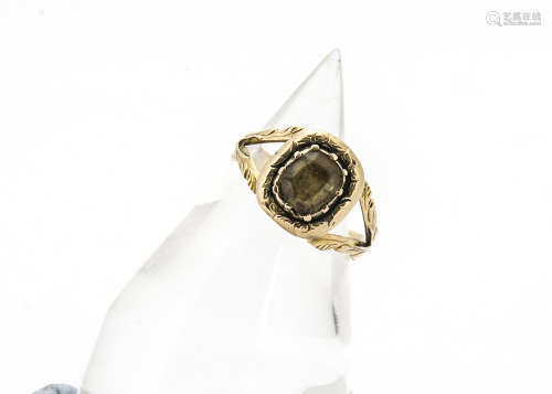 A 19th Century gold and citrine mourning ring, the cushion cut stone in wreath setting on a