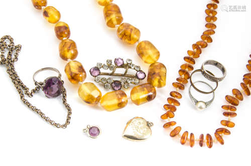 Two Baltic amber knotted strung necklaces, and a 19th Century gold plated part muff chain and