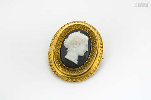 A 19th Century hardstone cameo brooch, the carved profile of a classical female head in an