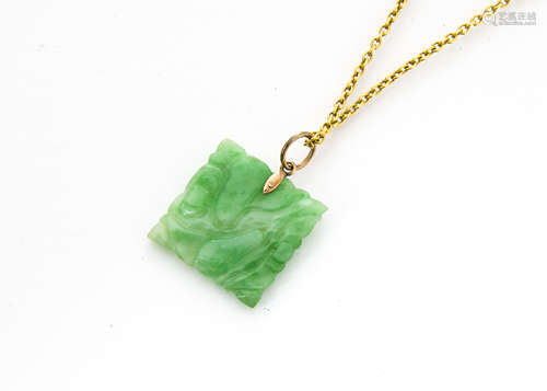 A Chinese jade square carved pendant, on gold mount and yellow metal chain, panel carved with