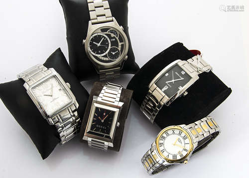 A group of five modern fashion watches, all boxed, including a Ben Sherman, Gucci, Storm, Pierre