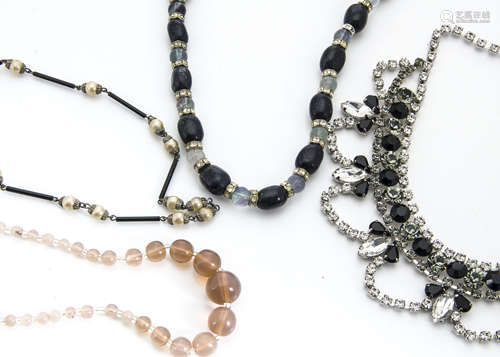 A quantity of coral, paste and hardstone beads, including two rosary examples