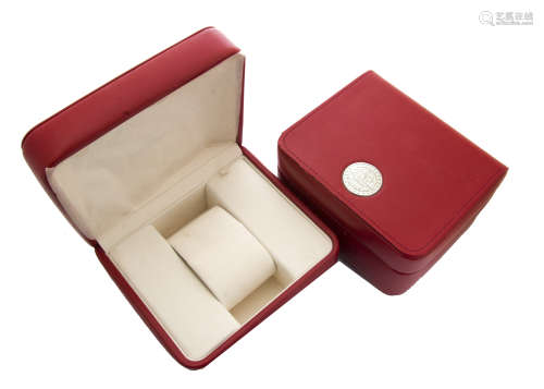 Two modern Omega red watch boxes, both with outer card boxes