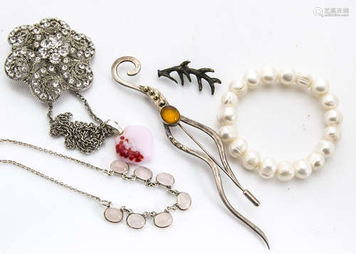 A contemporary silver and amber pin, by Gay Crichton Miller, a cultured pearl bracelet, paste set