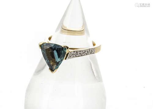 A contemporary alexandrite and diamond set dress ring, the triangular cushion mixed cut central