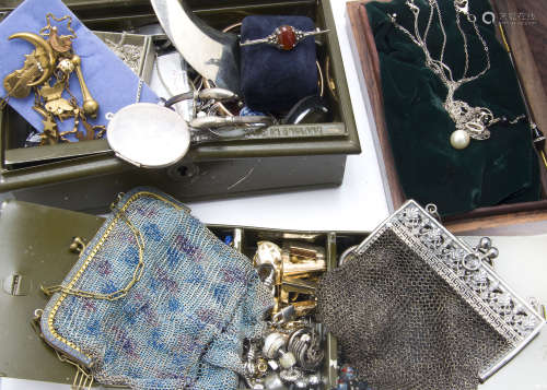 A collection of vintage and modern jewellery, including a 925 marked dolphin bangle, a rolled gold