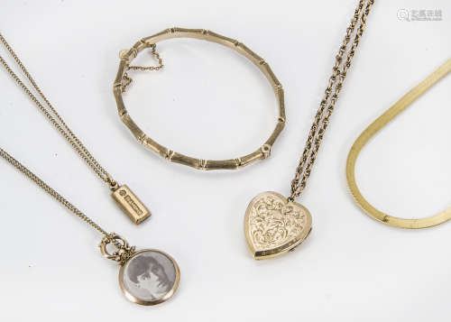 Five vintage and modern items of gold jewellery, including a bamboo bangle, a gold front and back