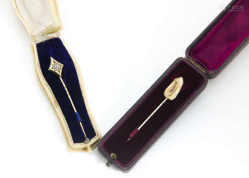 A late 19th Century 18ct marked diamond stick pin, in an ivorine case together with a tooth