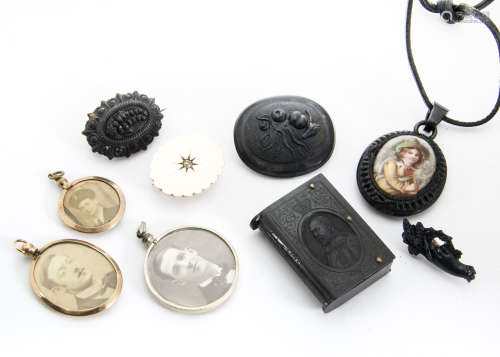 A small collection of mourning jewellery, to include a jet oval locket with porcelain mount, a bog