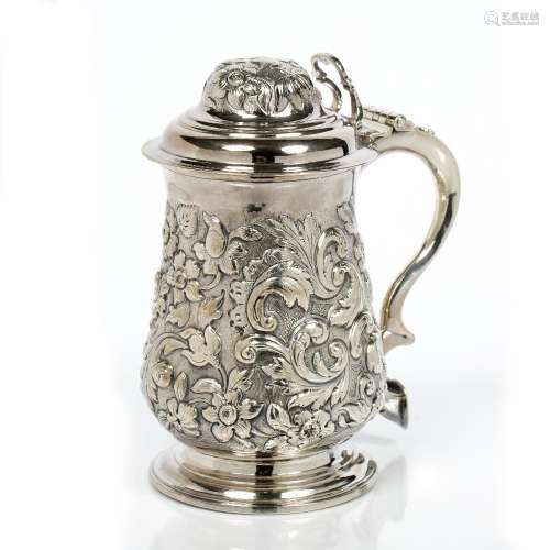18th Century silver lidded tankard with later embossed decoration, London 1776, 729 grams, 21cm