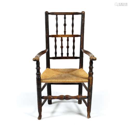 Elm and ash elbow chair 19th Century, with rush seat, 64cm across x 111cm high