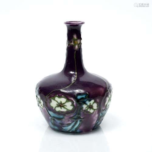 Minton, a secessionist vase No. 33, ovoid form, purple glazed tube lined design of stylized flowers,