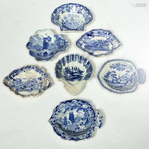 Group of seven English pottery blue transfer pickle dishes each of leaf form, to include Wedgwood