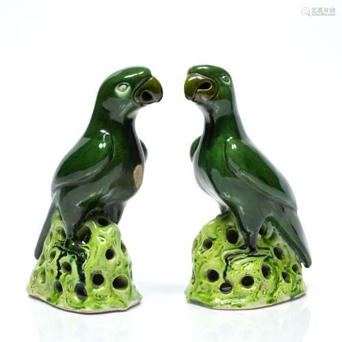 Pair of Chinese style pottery model parrots 20cm high