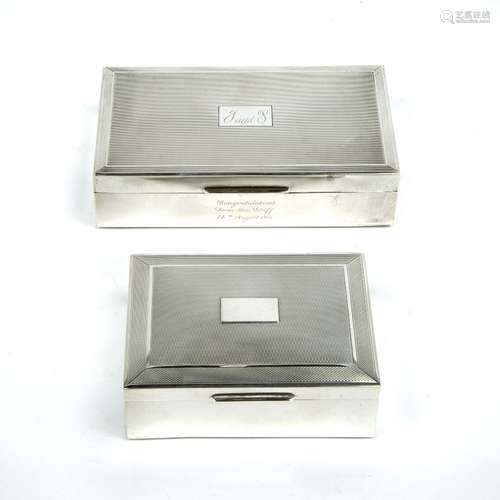 Two silver cigarette boxes with engine turned decoration (one monogrammed with presentation