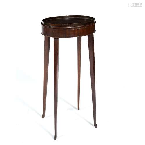 Mahogany candle stand early 19th Century, of oval form with slide, 33cm across x 24cm deep x 69cm