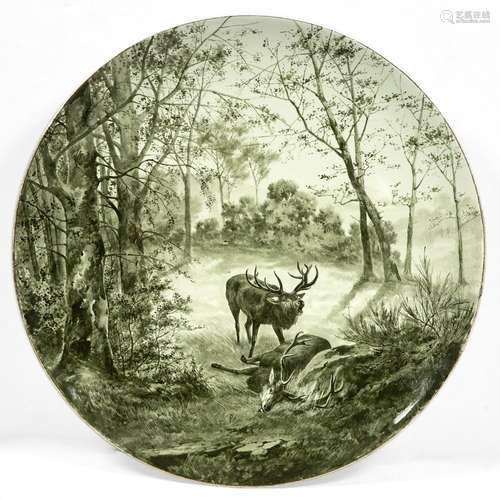 Large Continental pottery charger painted in monochrome with two stags, 60cm