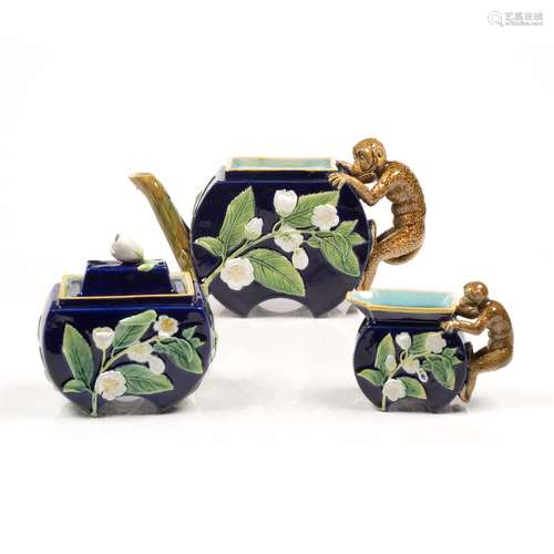 George Jones Majolica teapot, milk jug and sugar bowl, late 19th century, decorated with white