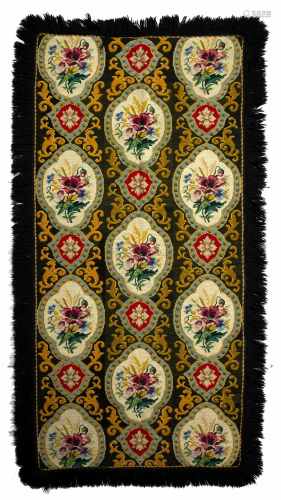 Russian tapestry rug on a black ground with foliate quatrefoil panels, 191cm x 83cm and five