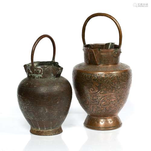 Two Italian copper water carriers 15th Century style, with embossed foliate decoration, both with