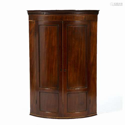 Mahogany and inlaid corner cupboard 19th Century, with bow front, 77cm across x 113cm high