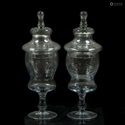 Pair of large glass sweetmeat jars and covers 44cm high