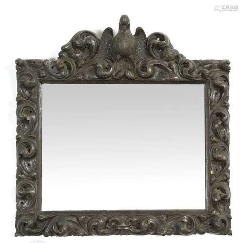 Carved wood mirror late 19th Century, with eagle mount and later glass, 51cm across x 51cm high