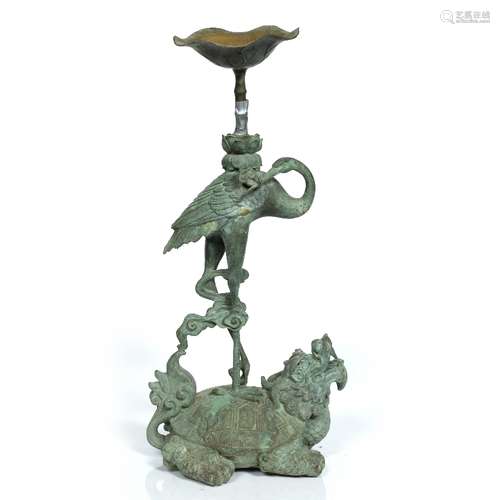 Chinese bronze stand late 19th/early 20th Century, in the form of a heron standing on the back of