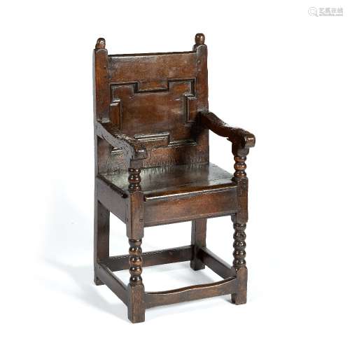 Walnut child's Wainscot armchair 17th Century, mouldings to the back, bobbin turnings to the arms