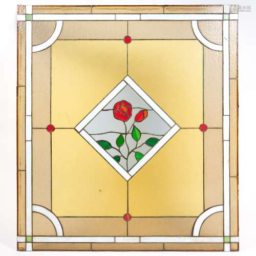 Leaded glass panel 20th Century, decorated with a central plaque depicting a flower, 90cm x 100cm