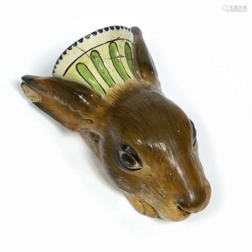 Turner pottery stirrup cup circa 1800, modelled as a hare, the coat in shades of brown, decorated in