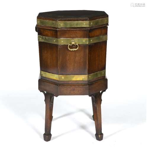 Mahogany and brass cellarette of octagonal form, 43cm across x 74cm high