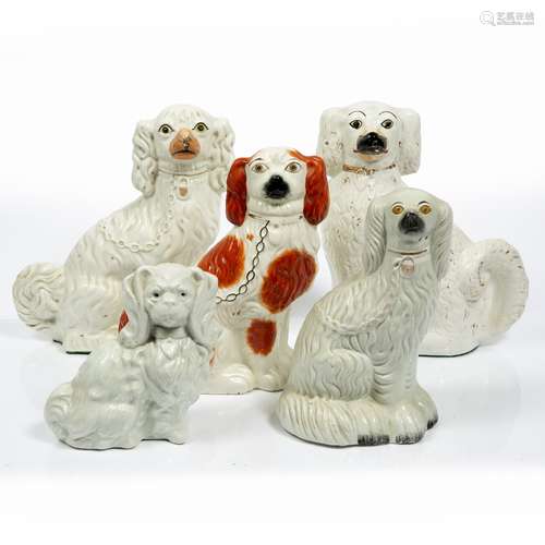 Five Staffordshire dogs of different sizes, (5)