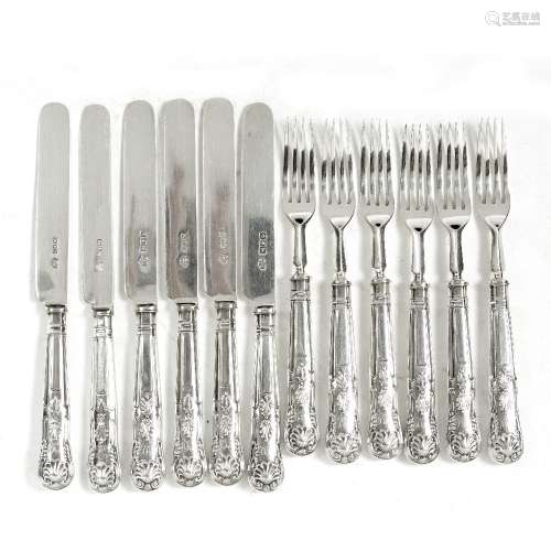 Set of six silver handled fruit knifes and forks in the shell pattern