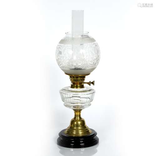 Brass and glass oil lamp Victorian, with cut glass reservoir, raised on a brass pillar,