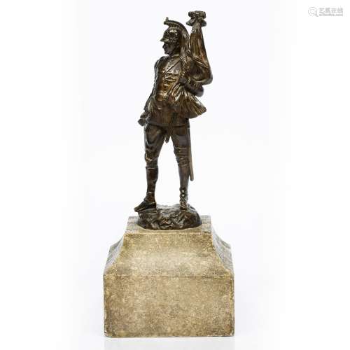 Bronze guard holding a flag and sword circa 1900, on a stone plinth, 34.5cm high overall