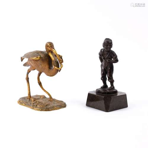 Dutch bronze figure of a boy 20th century, on a marble base, 13cm high, together with a brass