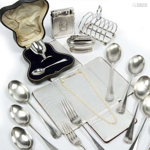 Silverplated toast rack a string of pearls by Mikimoto, a Dupont cigarette lighter, a Ronson