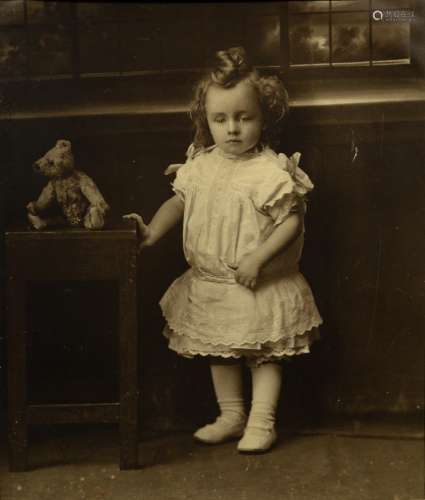 Early photographic study of a child with a teddy bear circa 1895, framed, ex Oliver Bradbury and